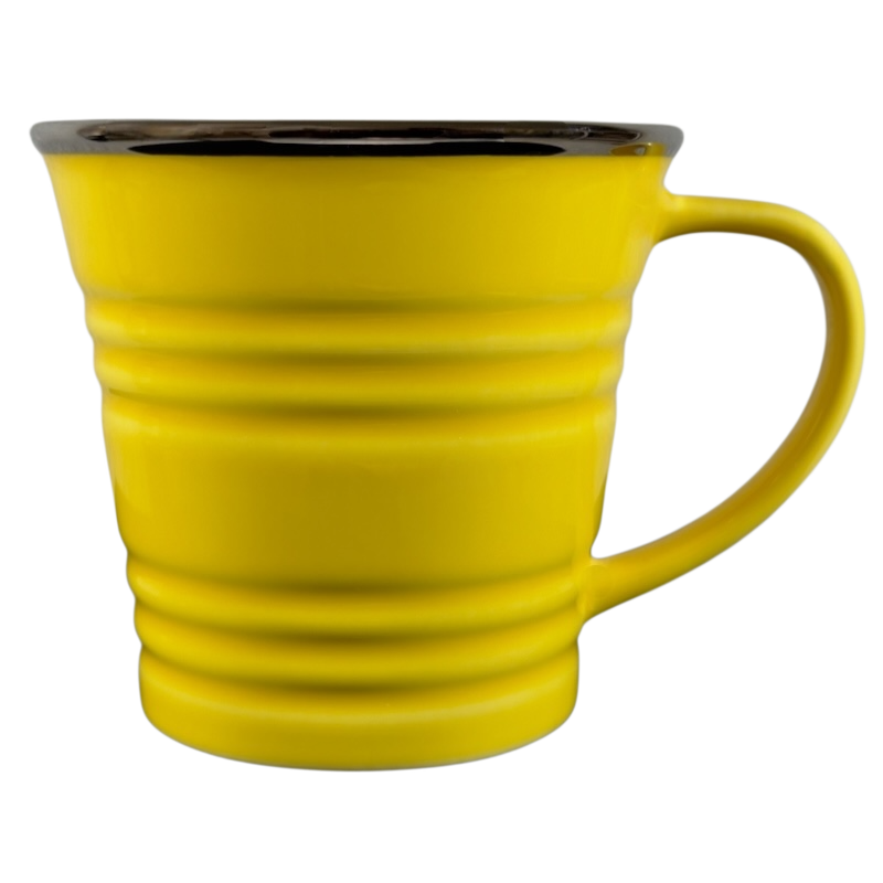 Vintage Starbucks yellow sand pail mug with ridged design and smooth handle