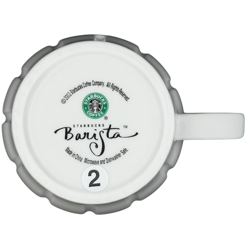 Bottom view of vintage Starbucks white siren ribbed mug with Barista logo and care instructions