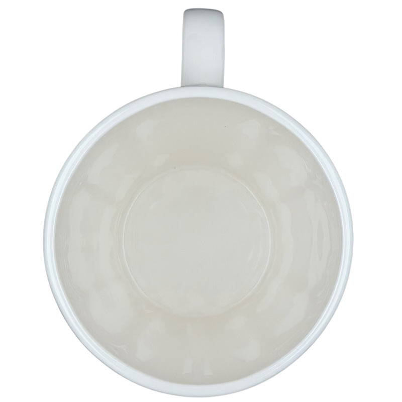 Vintage Starbucks white siren ribbed mug viewed from above showing smooth interior and ribbed exterior design