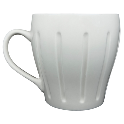Vintage Starbucks white siren ribbed mug with a comfortable handle and elegant ribbed design