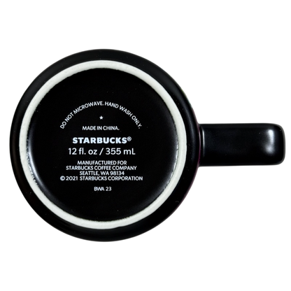 Bottom view of black Starbucks mug showing logo manufacturing stamps 12 fl oz Yiqiao Wang American Sign Language Starbucks mug