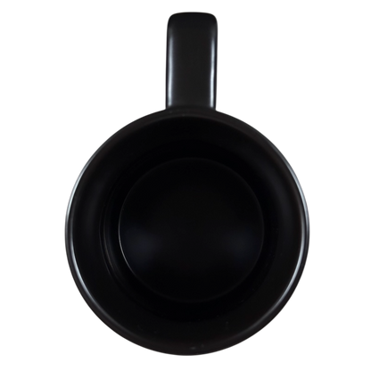 Top view of black ceramic Yiqiao Wang American Sign Language Starbucks mug empty glossy handle at top