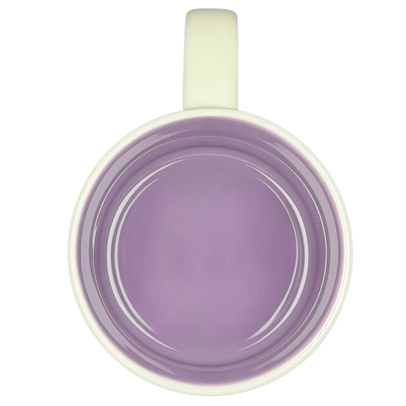 Inside view of You Are Here Collection Disneyland Fantasyland Mug Starbucks featuring a pastel purple interior