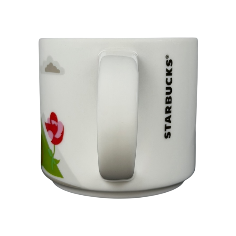 Starbucks You Are Here Portland mug featuring colorful flowers and iconic Portland skyline design