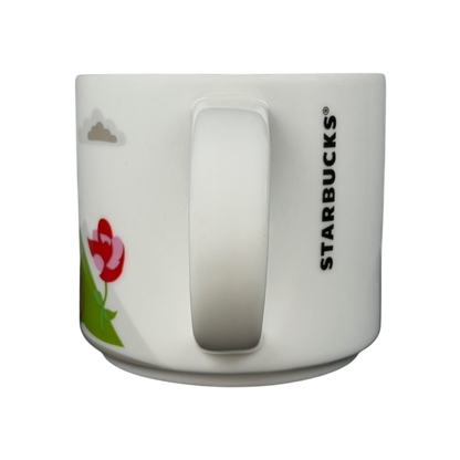 Starbucks You Are Here Portland mug featuring colorful flowers and iconic Portland skyline design