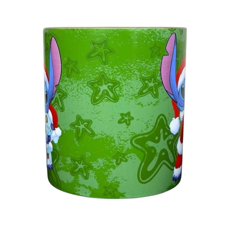 Disney Stitch Santa holiday collectible mug featuring Stitch in a festive design with green background