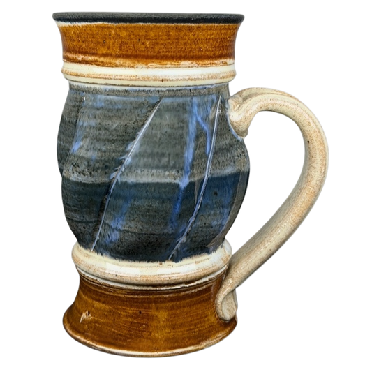 Handcrafted studio pottery jumbo swirled mug with a unique design and earthy tones