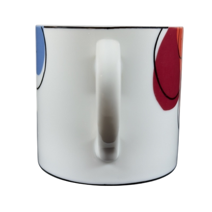 Swid Powell collectible mug featuring a modern design with colorful patterns and a sleek handle