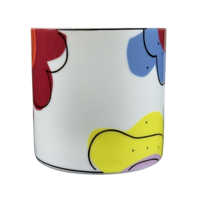 Swid Powell collectible mug featuring a colorful floral design on a white background