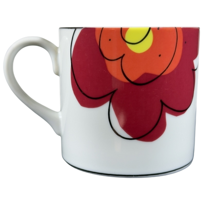 Swid Powell collectible mug featuring vibrant floral design with bold colors and sleek shape