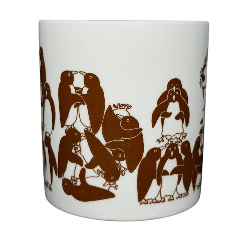 Taylor & Ng Animates vintage brown penguins mug featuring playful penguin illustrations