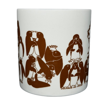 Taylor & Ng Animates vintage brown penguins mug featuring playful penguin illustrations