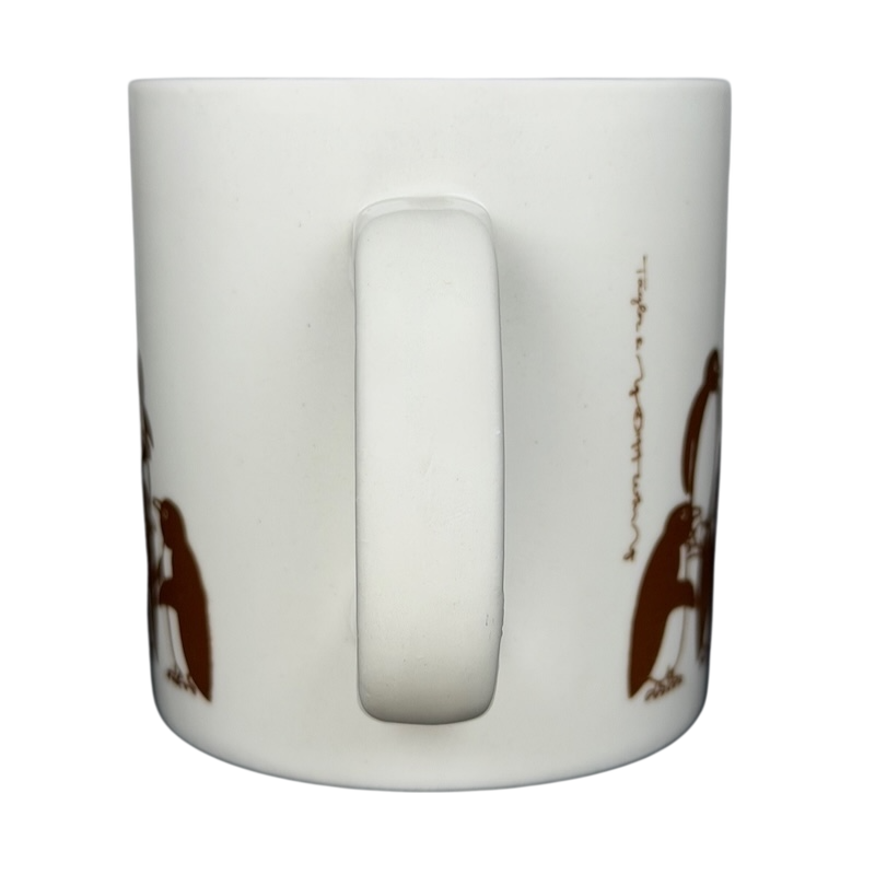 Taylor & Ng Animates vintage brown penguins mug featuring adorable penguin illustrations