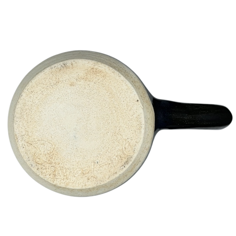 Top view of Duck Yeah Tea Bag Time Pottery Mug in a natural color with a black handle