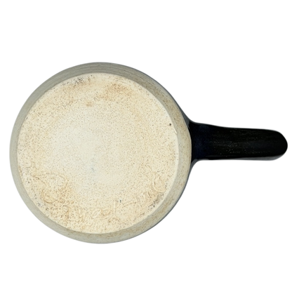 Top view of Duck Yeah Tea Bag Time Pottery Mug in a natural color with a black handle