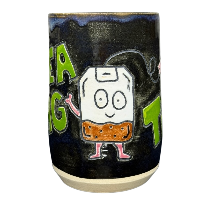 Tea Bag Time Pottery Mug Duck Yeah featuring a cute cartoon tea bag design on a dark background