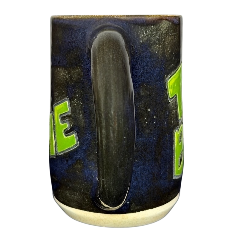 Duck Yeah Tea Bag Time Pottery Mug featuring a vibrant blue and green design