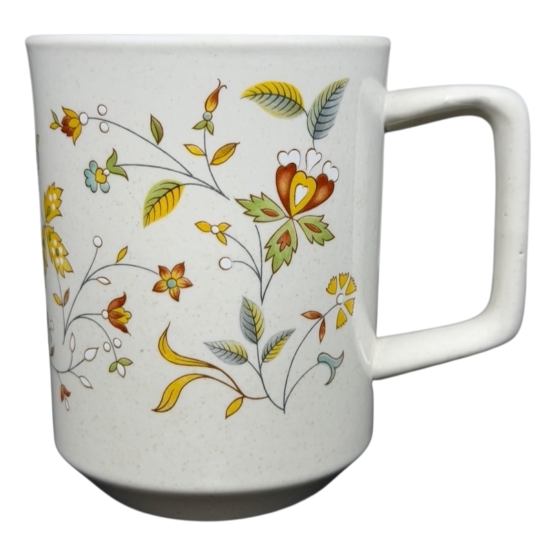 Lenox Temperware Merriment Mug featuring colorful floral designs on a speckled background