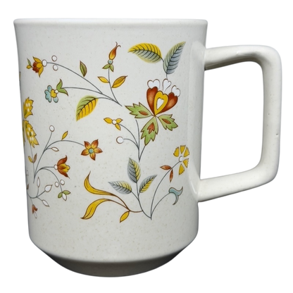 Lenox Temperware Merriment Mug featuring colorful floral designs on a speckled background