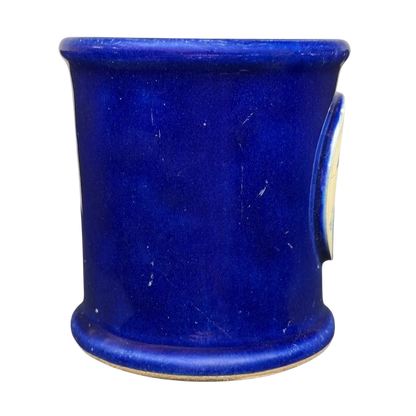 The Broadmoor Colorado Pottery Mug in vibrant blue with a smooth finish and classic design