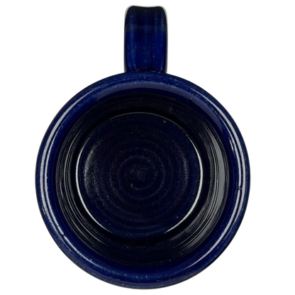 Top view of The Broadmoor Colorado Pottery Mug in deep blue ceramic finish
