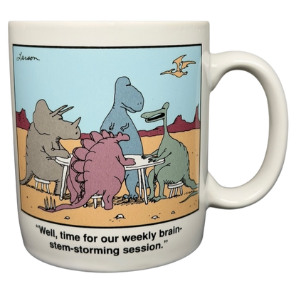 The Far Side dinosaur mug featuring cartoon dinosaurs at a brainstorming session in a desert scene
