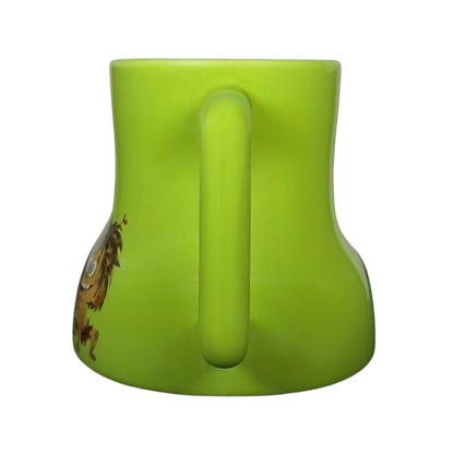 The Good Dinosaur Arlo Spot mug in vibrant green with a cute character design