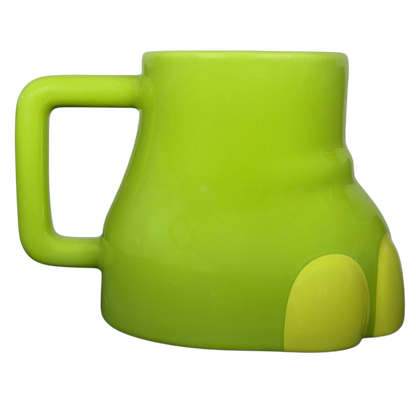 Disney The Good Dinosaur Arlo Spot mug in vibrant green with a unique shape for fun sipping