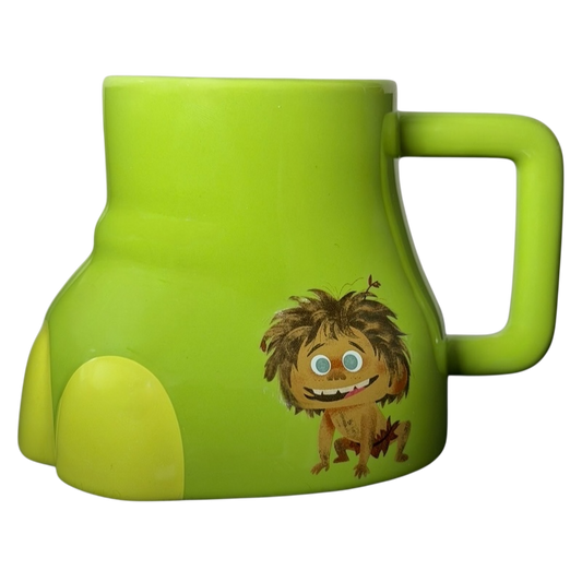 The Good Dinosaur Arlo Spot mug in green with a playful character design for fans of the movie