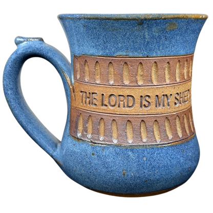 Handcrafted stoneware pottery mug in blue with the phrase The Lord is My Shepherd
