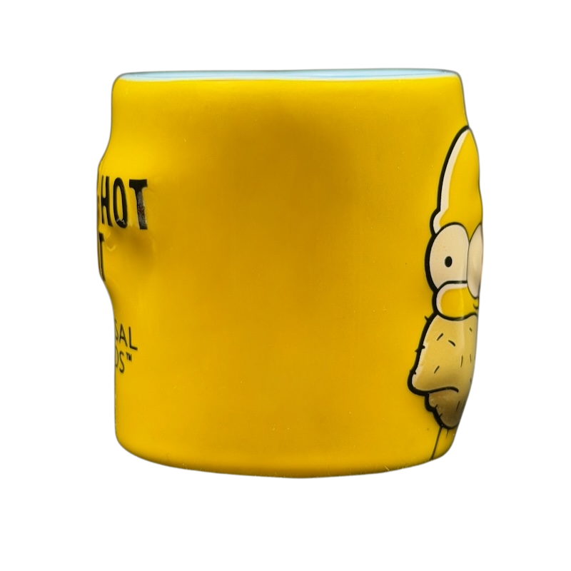 The Simpsons Homer Simpson Not-So-Hot Shot Universal Studios Mini Mug in bright yellow with cartoon design