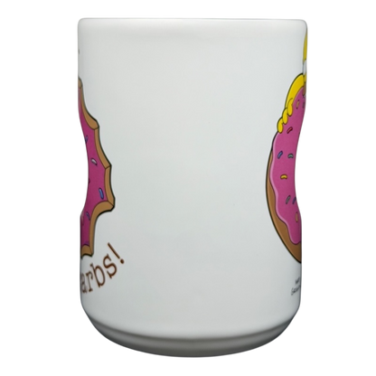 The Simpsons Homer Universal Studios donut mug featuring colorful donut graphics and fun text