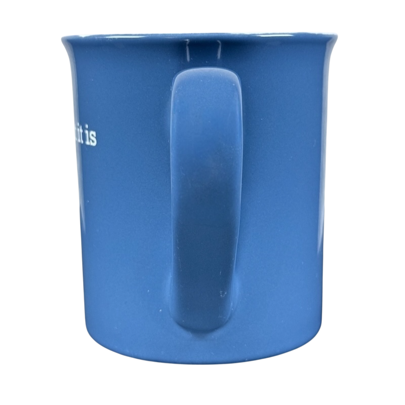 THL blue ceramic mug with handle facing forward featuring white text it is what it is rare mug on black background