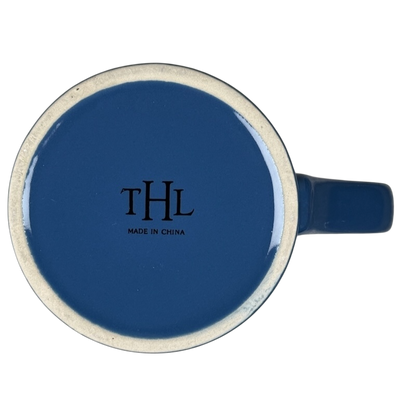 Top view of blue ceramic THL mug showing underside logo and handle it is what it is rare mug