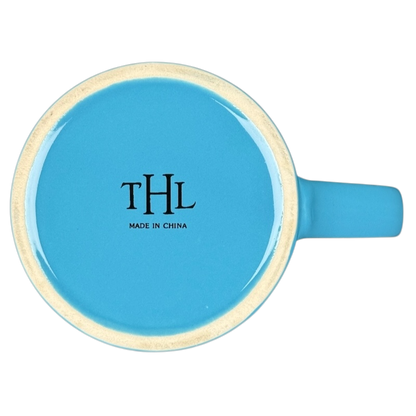 make it happen blue THL mug top view showing stamped THL Made in China on glossy blue ceramic base with handle to right