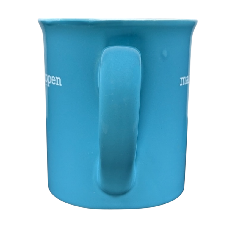 make it happen blue THL mug showing front handle centered on blue ceramic cup with white side text