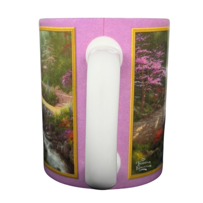Thomas Kinkade Bridge of Faith vintage mug featuring scenic floral artwork and a vibrant design
