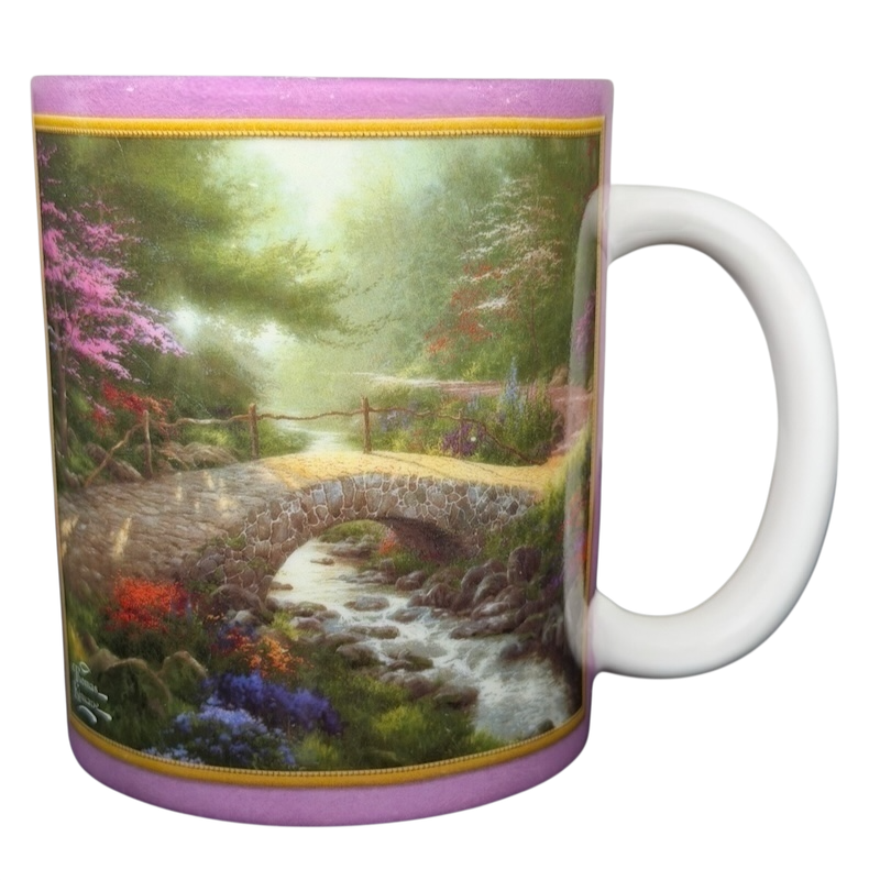 Thomas Kinkade Bridge of Faith vintage mug featuring a serene landscape with a stone bridge and colorful flowers