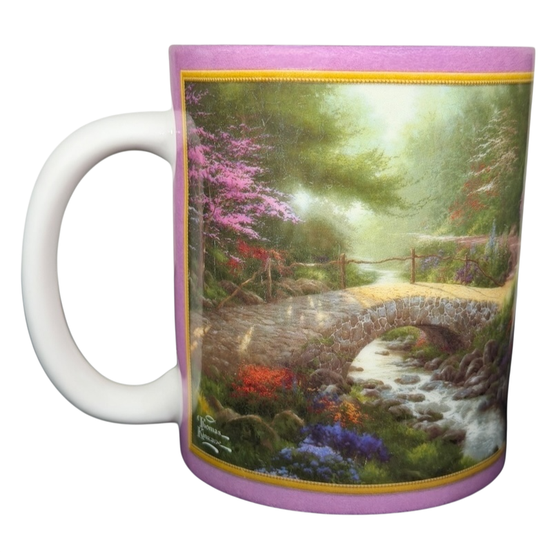 Thomas Kinkade Bridge of Faith vintage mug featuring a serene painted bridge and colorful flowers