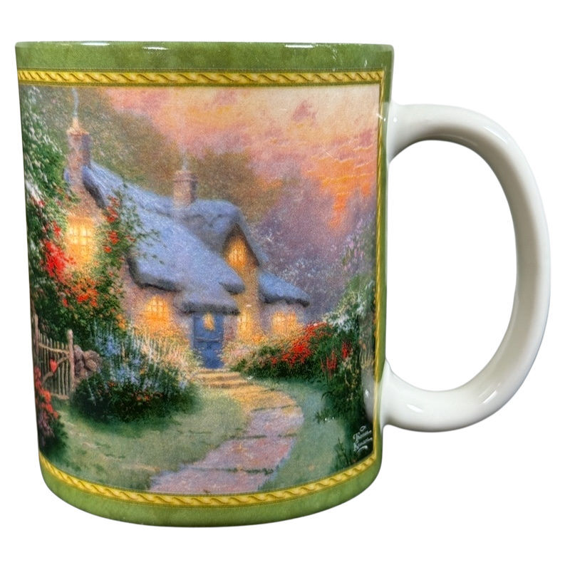 Thomas Kinkade Glory of Evening vintage coffee mug featuring a glowing cottage scene with lush garden and sunset sky