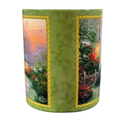 Thomas Kinkade Glory of Evening vintage coffee mug with green background and scenic sunset design