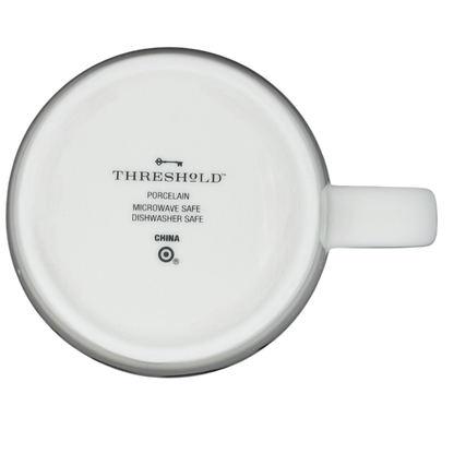 Bottom view of a Threshold Cancer Astrology Zodiac Mug showing porcelain and care instructions