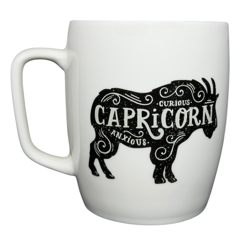 Threshold CAPRICORN Astrology Zodiac Mug featuring a black goat design and artistic text