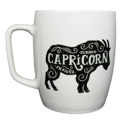Threshold CAPRICORN Astrology Zodiac Mug featuring a black goat design and artistic text