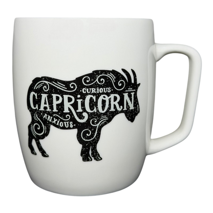 Threshold Capricorn Astrology Zodiac Mug featuring a goat design with curious and anxious text