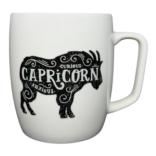 Threshold Capricorn Astrology Zodiac Mug featuring a goat design with curious and anxious text