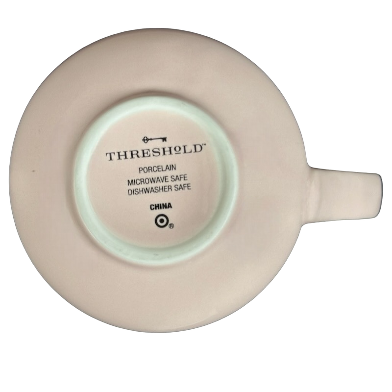 Bottom view of the Threshold hello lovely swan mug showing porcelain and dishwasher safe details