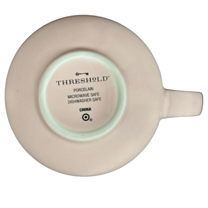 Bottom view of the Threshold hello lovely swan mug showing porcelain and dishwasher safe details