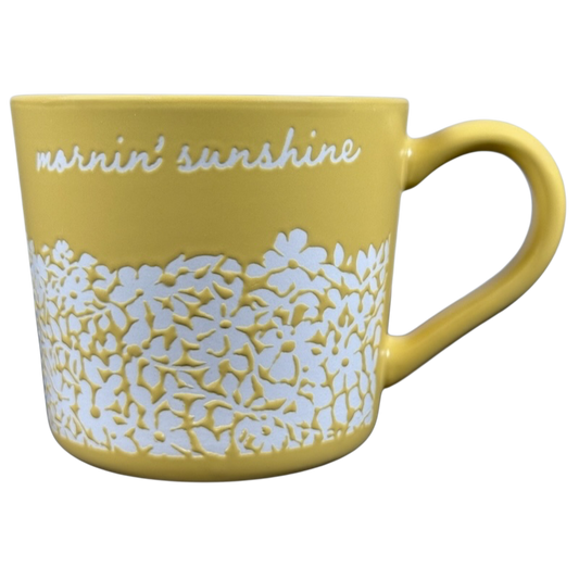 Yellow ceramic Mornin' Sunshine etched floral Threshold mug. White raised floral relief and curved handle