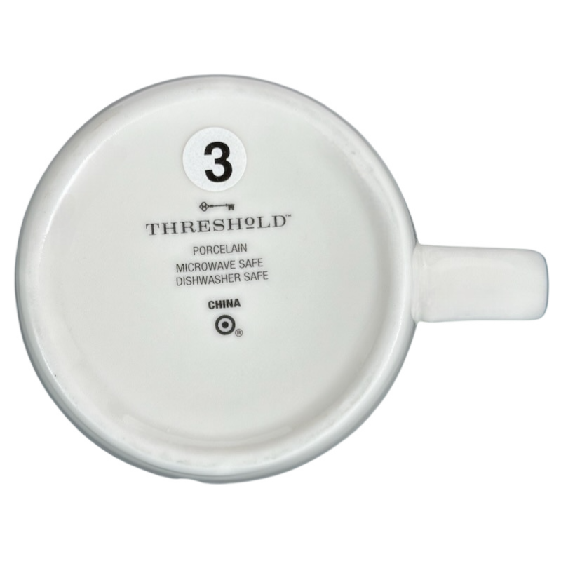 Bottom view of Threshold Sagittarius Astrology Zodiac Mug marked with safety and care instructions
